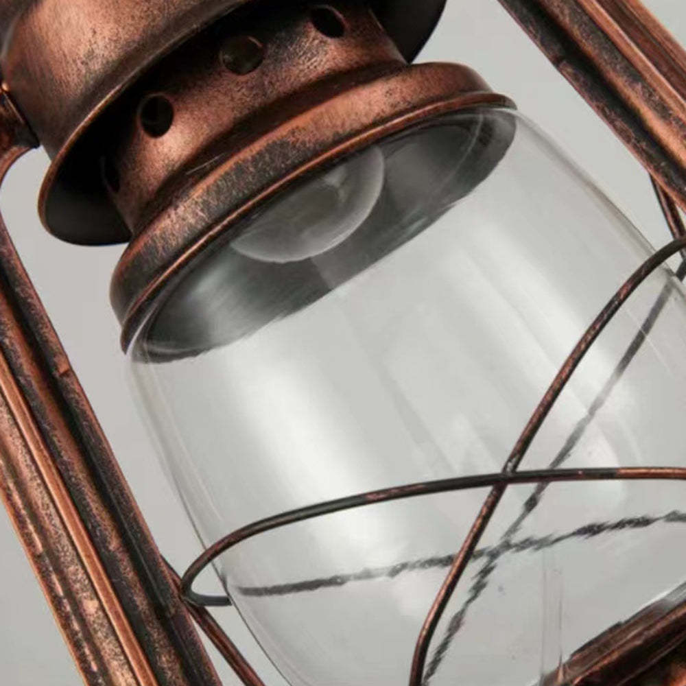 Close up of vintage metal and glass lantern pendant light.