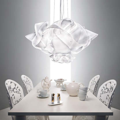 Bella flower pendant light over dining table