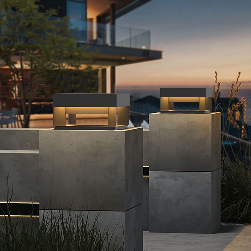 Riley solar post light on modern outdoor patio.
