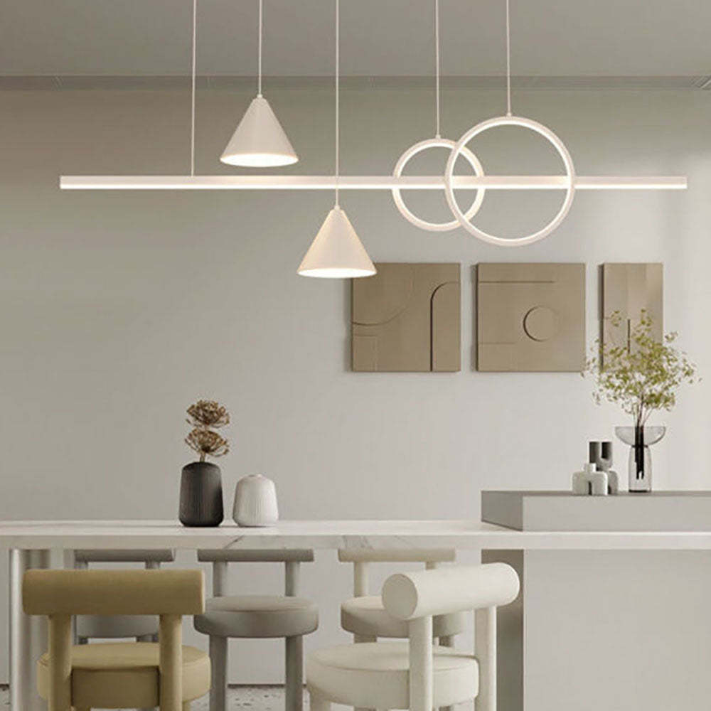 Contemporary geometric pendant lights over a dining table
