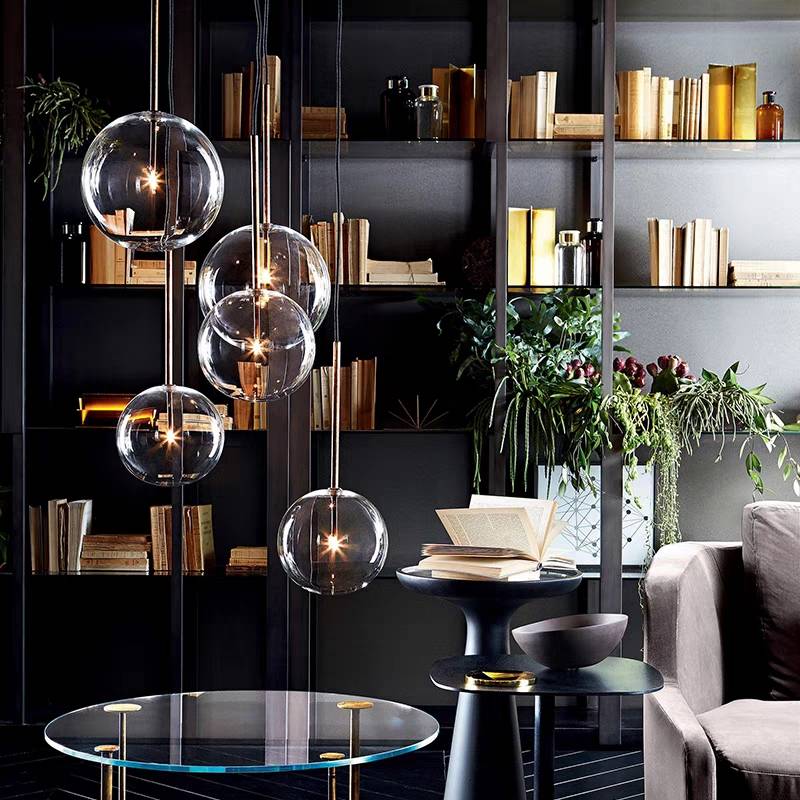 Modern living room featuring bubble pendant lights