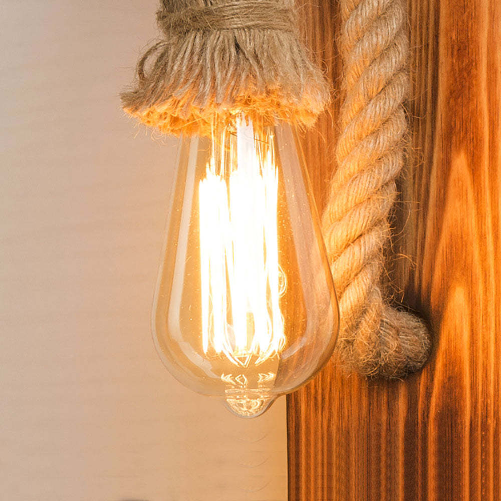 Rustic LED wall light with hemp rope accent.