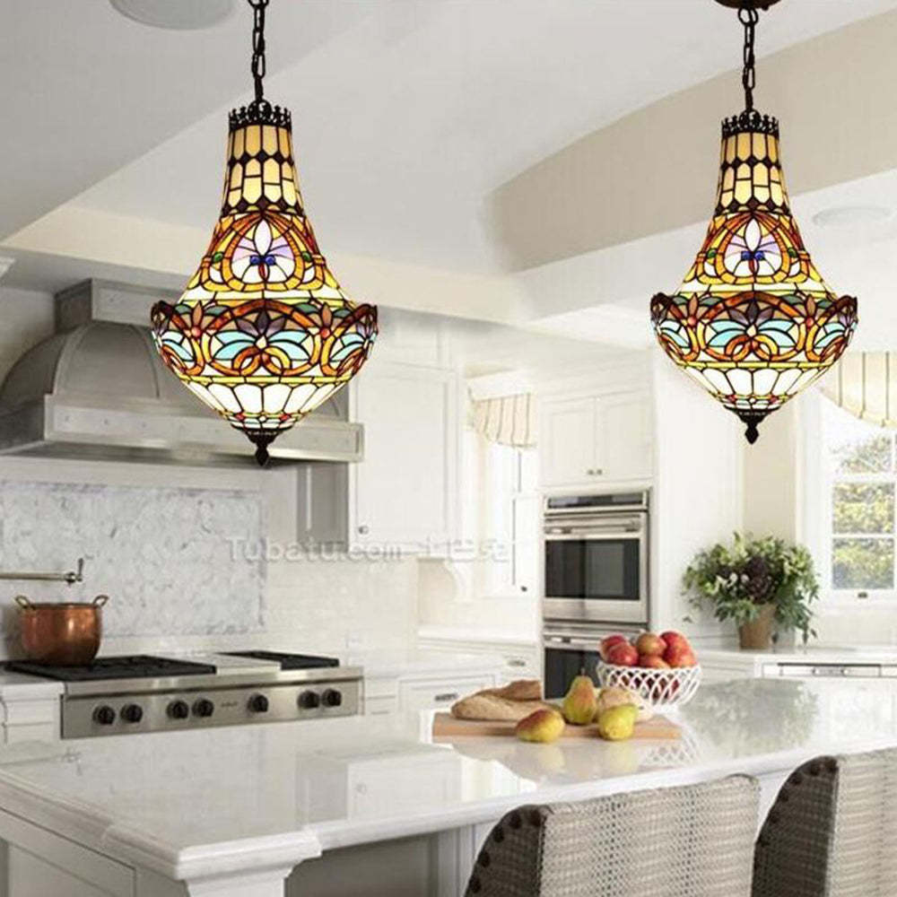 Colorful stained glass pendant lights over kitchen island