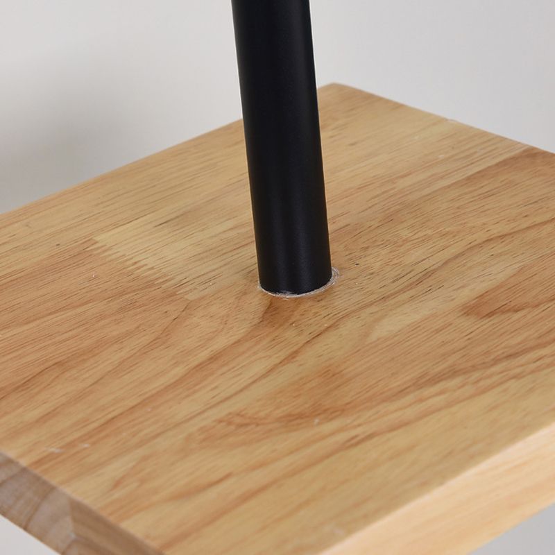 Eryn floor lamp: wood shelf & metal pole base.