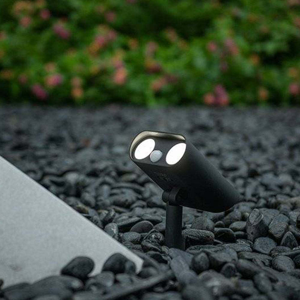 Orr Modern Black Outdoor Spotlight on gravel