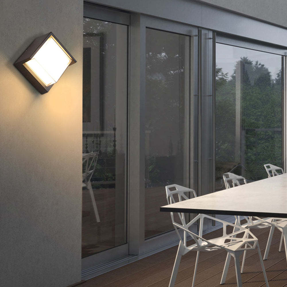 Orr Square Outdoor Wall Lamp illuminating patio