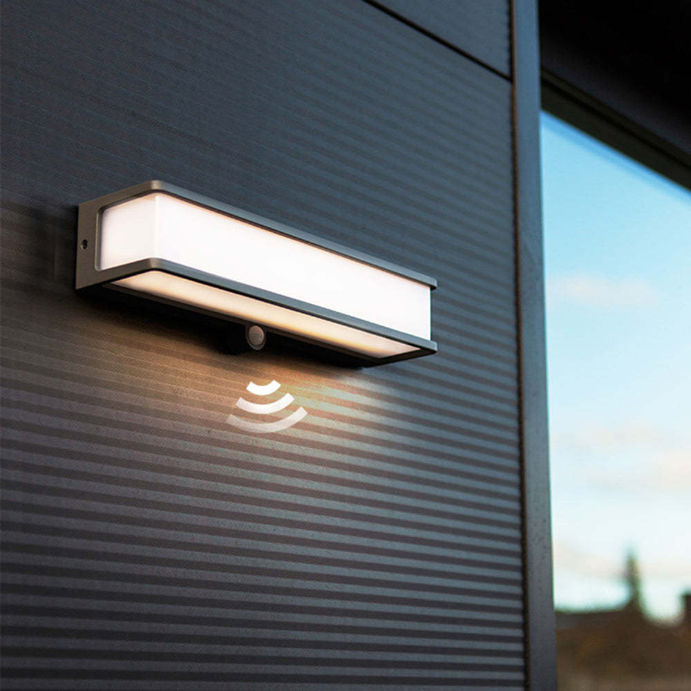 Orr minimalist solar wall lamp with motion sensor on dark siding.
