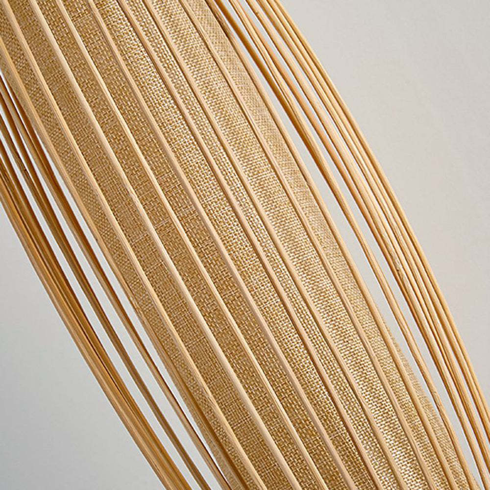Close-up of Muto Bamboo Rattan Wall Lamp texture.
