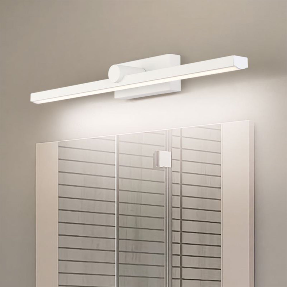 Creamy white Leigh wall lamp above mirror, bathroom lighting