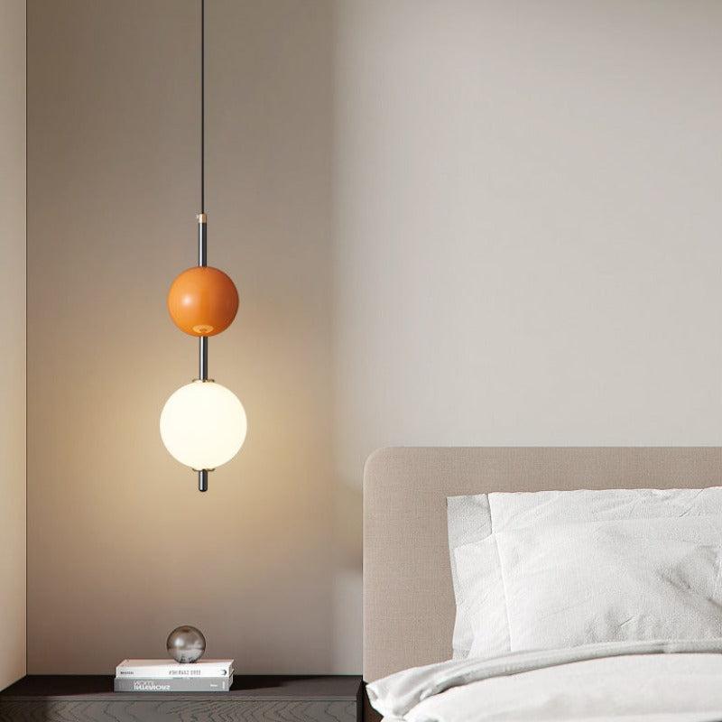 Modern bedroom pendant light with orange and white spheres