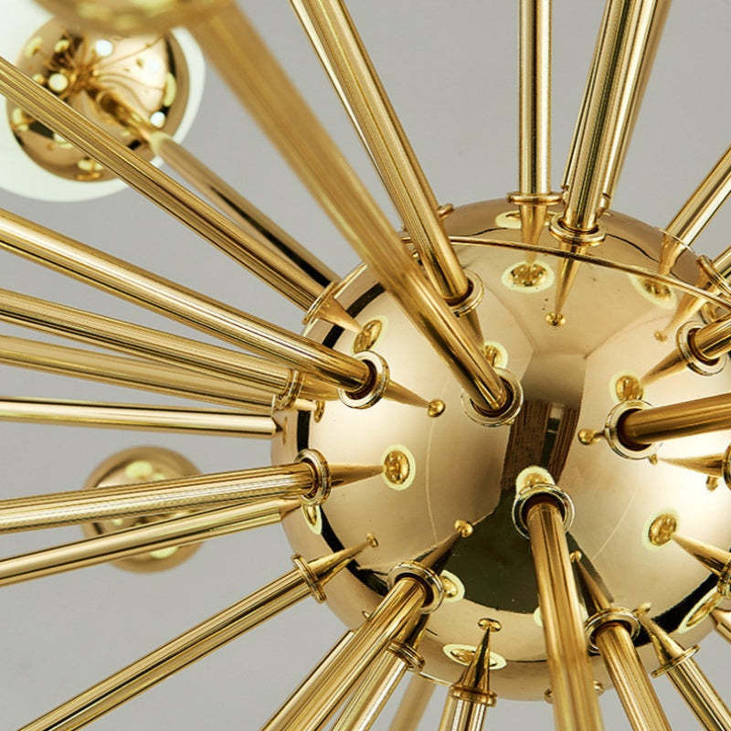 Alessio gold LED sputnik chandelier. Close up modern lighting.