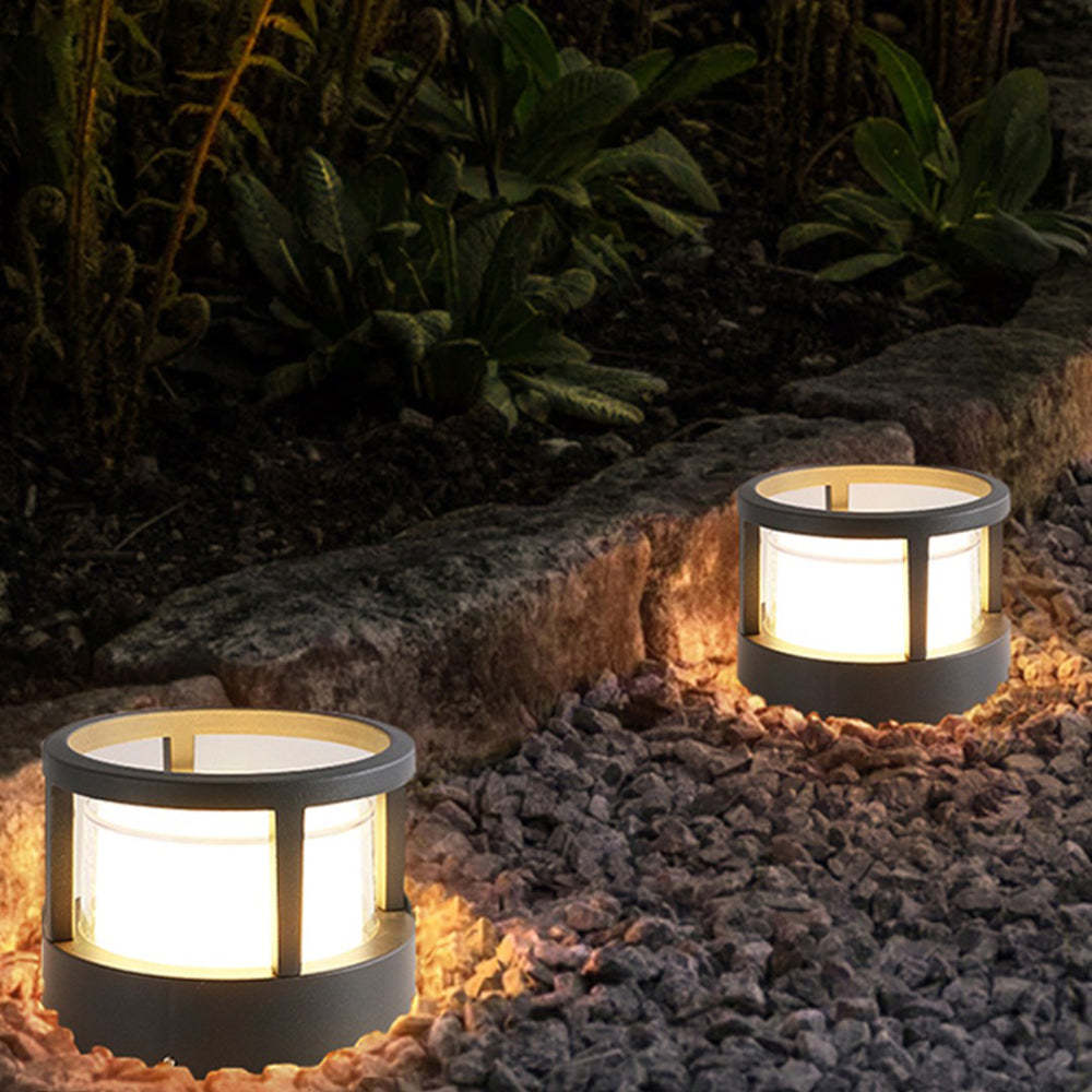 Pena outdoor bollard lights illuminating garden pathway