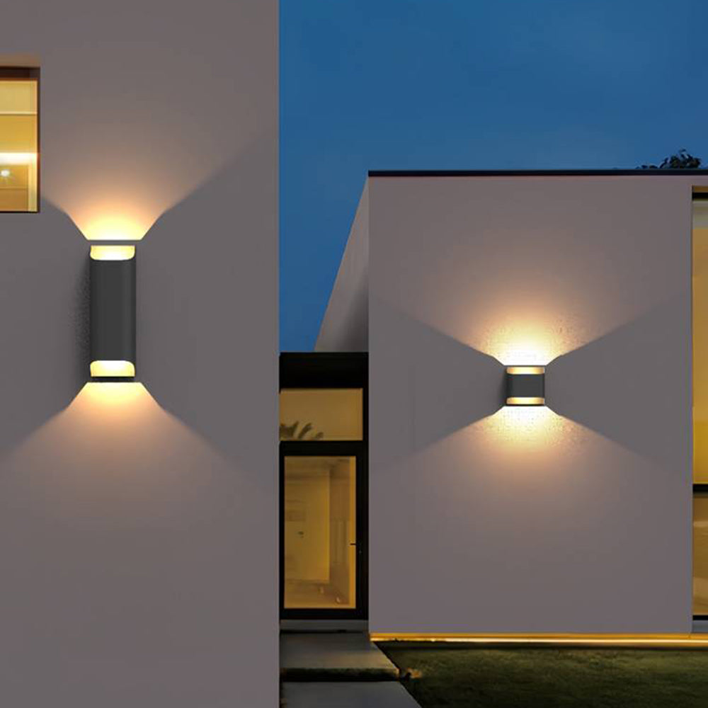 Modern outdoor wall lights illuminating building exterior