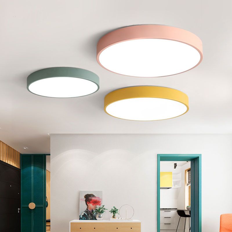 Morandi flush mount ceiling lights in pink, green and yellow.