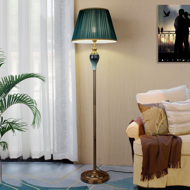 Eryn Antique Floor Lamp with green shade in living room, Las Sola