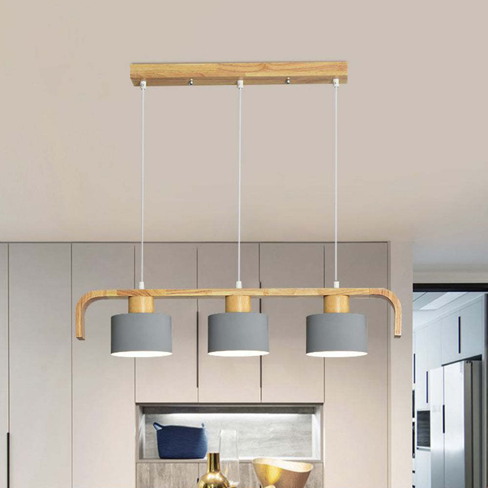 Wooden beam pendant light with three grey cylinder shades