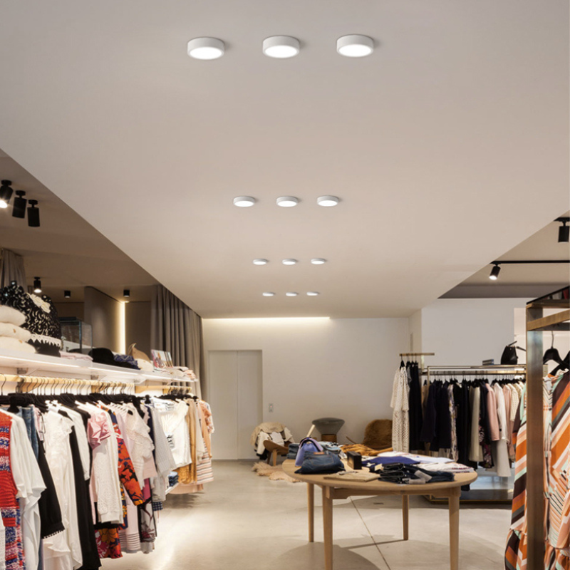 Modern boutique with Quinn flush mount ceiling lights