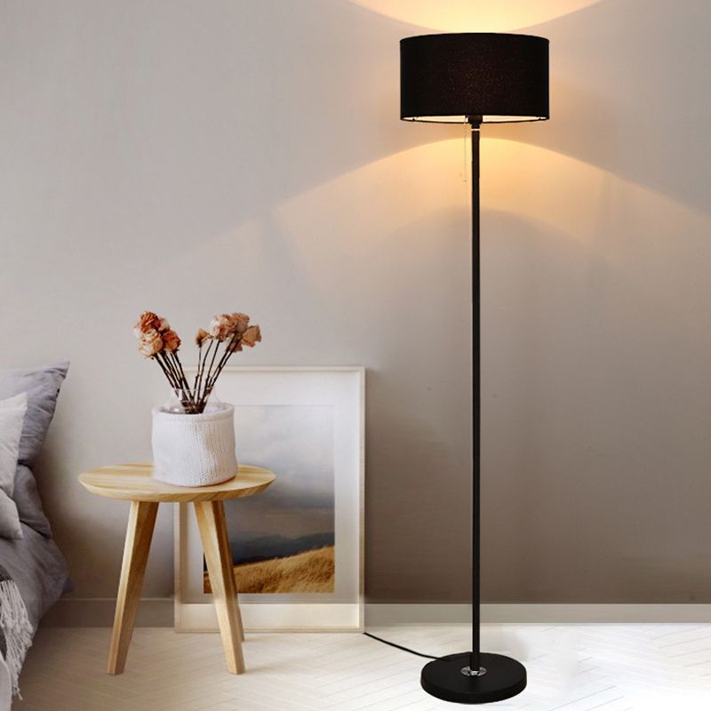 Eryn Black Cylinder Floor Lamp Near Bed