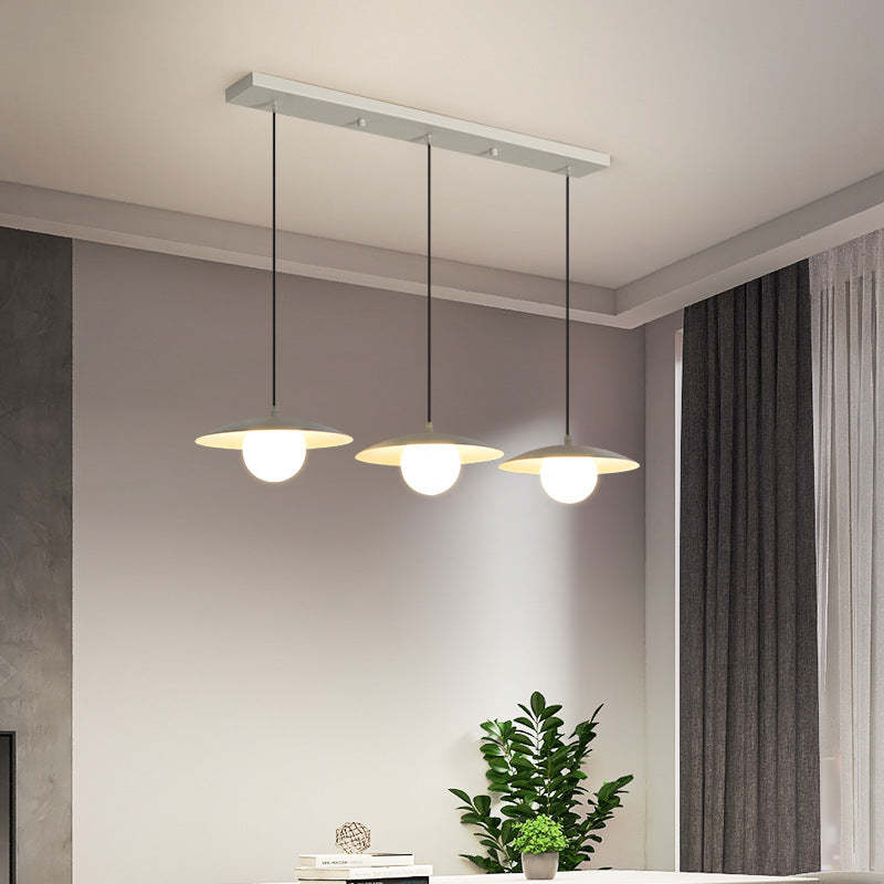 Modern Morandi pendant light fixture over dining room table