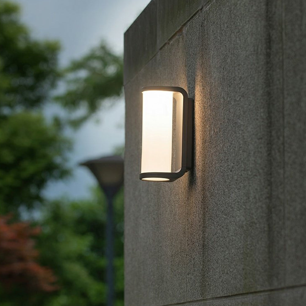 Orr modern outdoor wall lamp. Cylindrical metal light fixture.