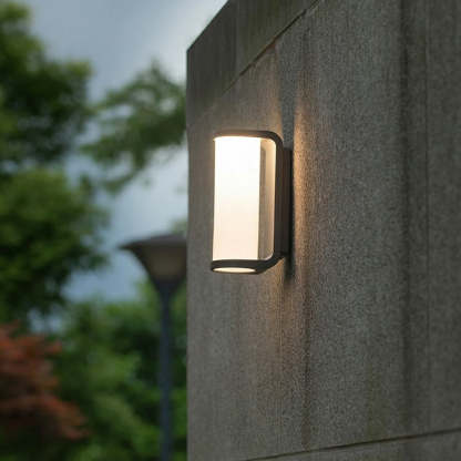 Orr modern outdoor wall lamp. Cylindrical metal light fixture.