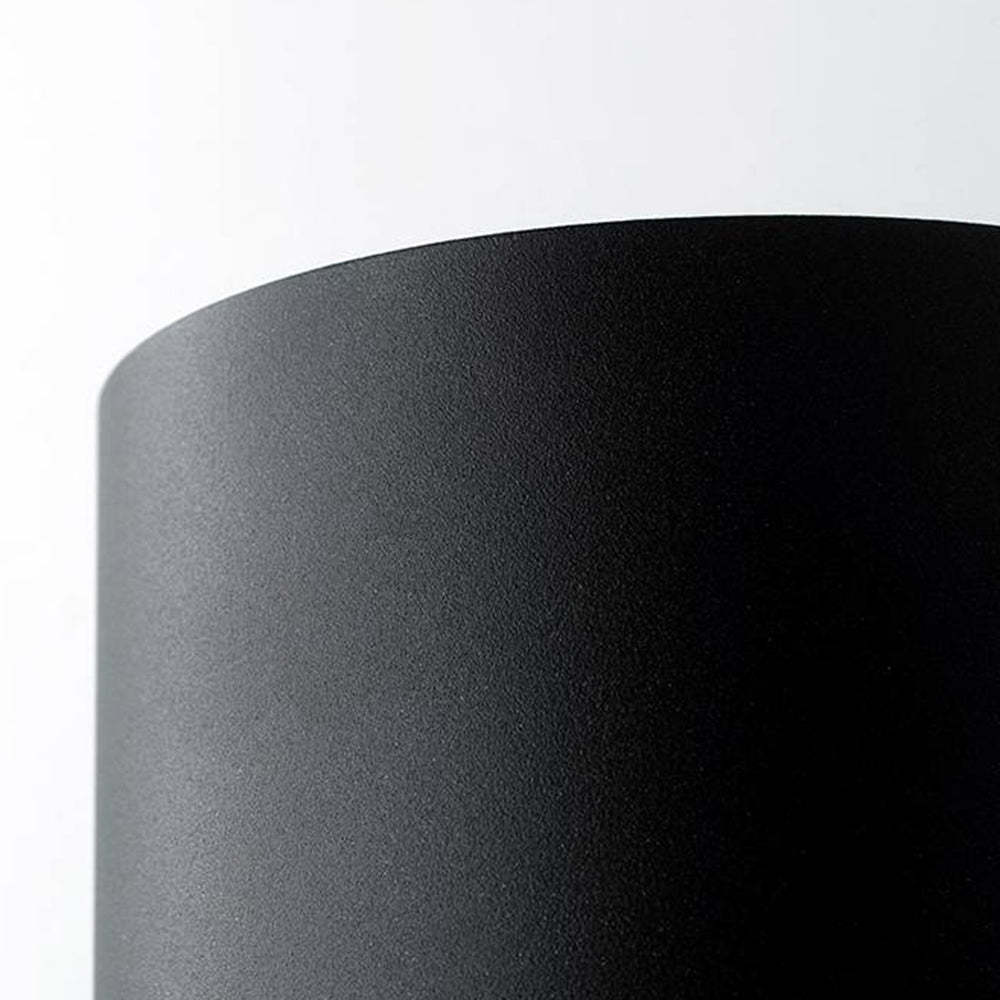 Close-up of Orr Modern Cylinder Outdoor Wall Lamp black metal texture