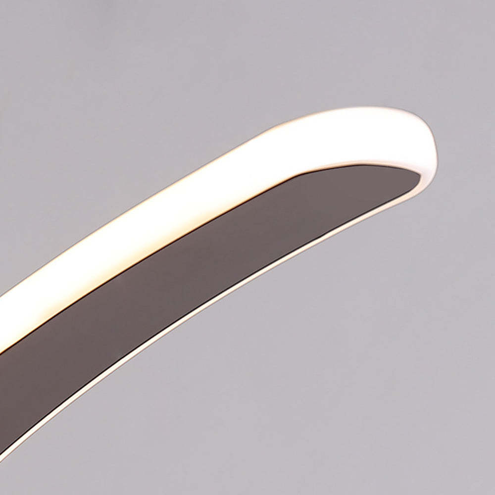 Close-up of Las Sola Edge arched floor lamp head.
