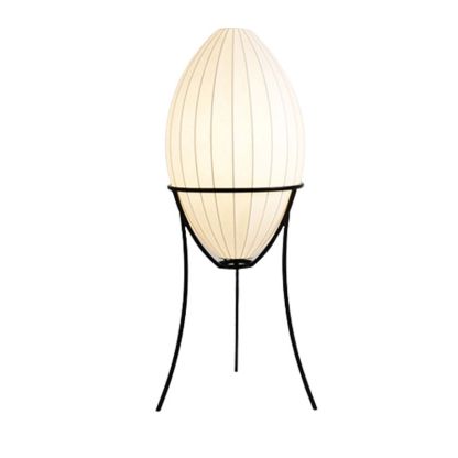 Modern egg-shaped floor lamp with fabric shade