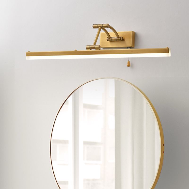 Gold Metal Leigh Vanity Wall Lamp above Round Mirror