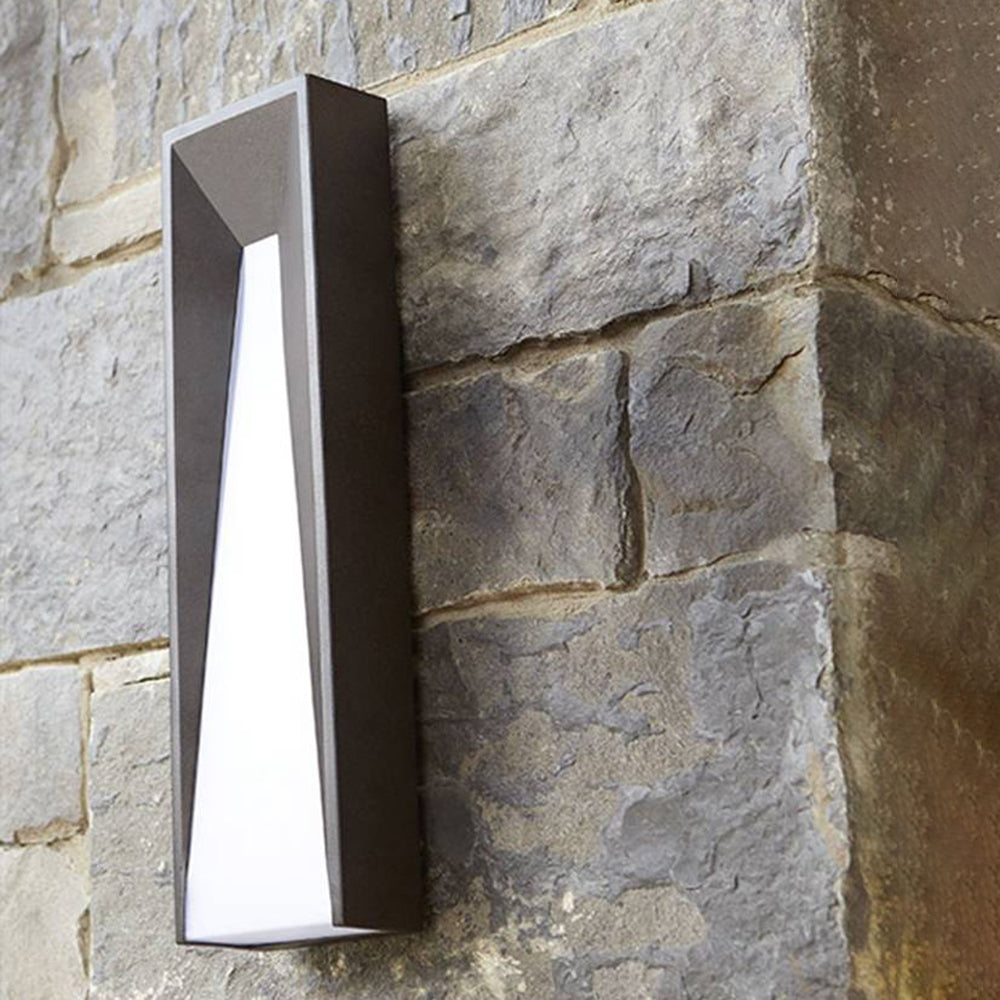 Modern outdoor wall lamp on stone wall