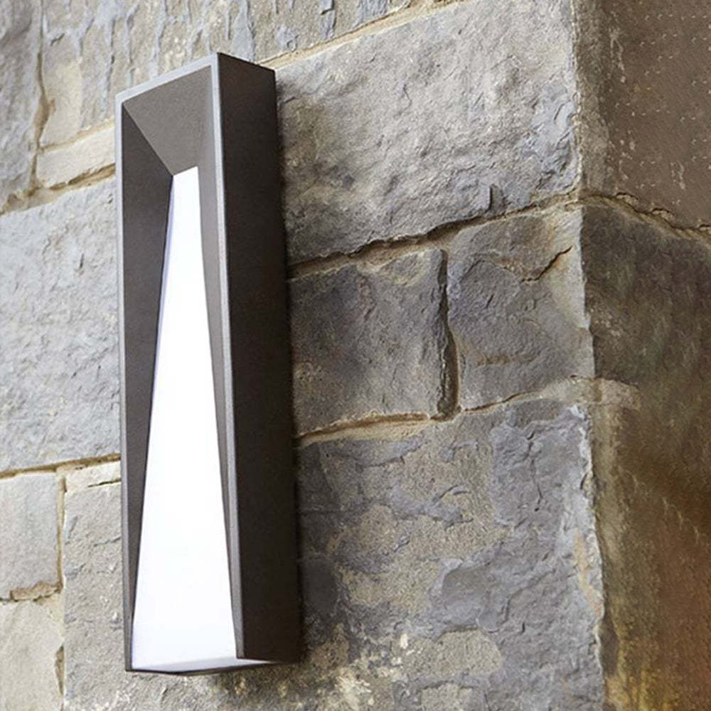 Modern outdoor wall lamp on stone wall