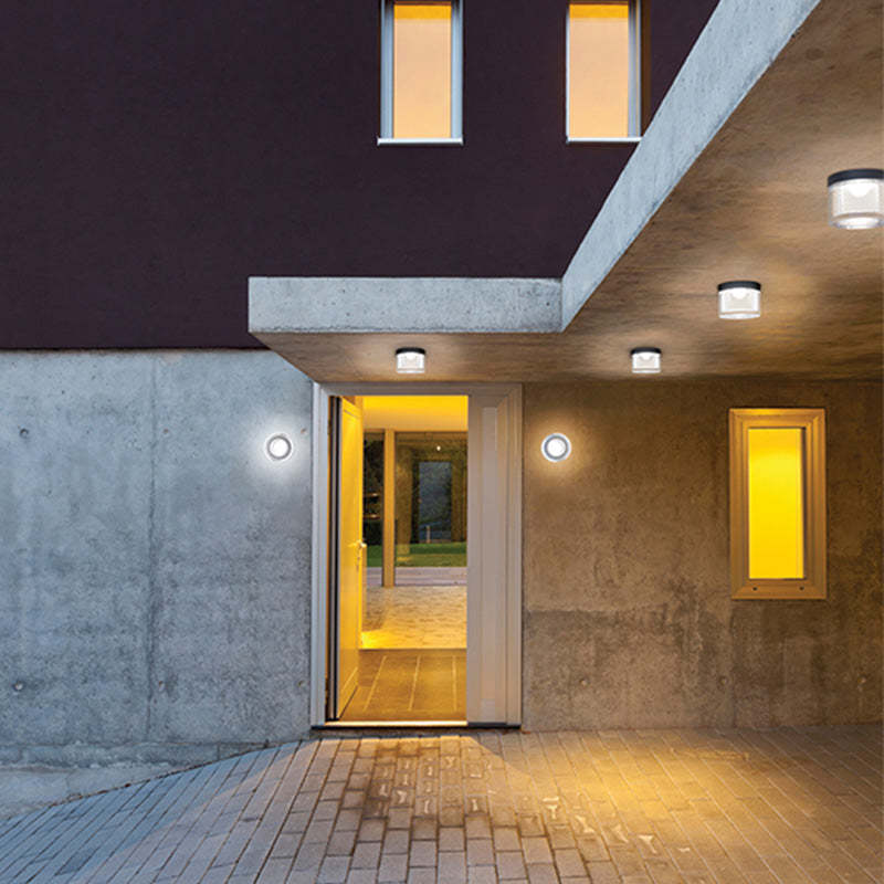 Outdoor wall lamp illuminating entrance, modern design