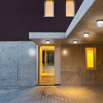 Outdoor wall lamp illuminating entrance, modern design