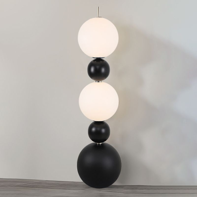 Valentina modern floor lamp: black and white resin glass spheres.
