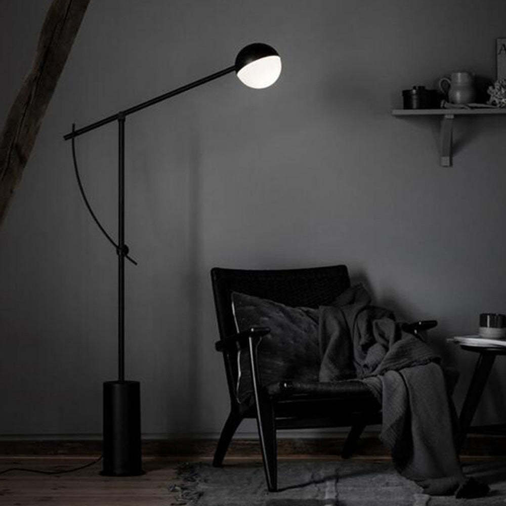 Salgado Modern Floor Lamp illuminating a cozy living room