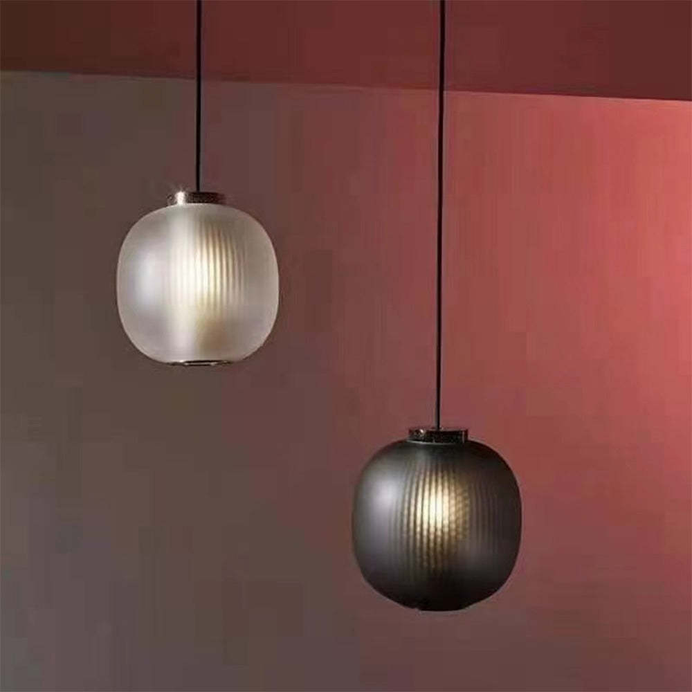 Hailie Frosted Glass Pendant Lights in white and black.