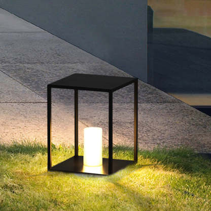 Pena Minimalist Outdoor Bollard Lamp illuminating garden