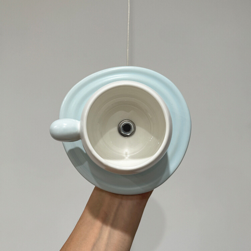 Cairns Pendant Light - Cup-shaped ceramic design, light blue and white.