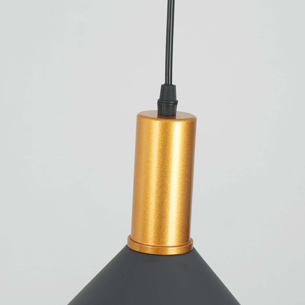 Carins pendant light: gold and gray metal fixture detail.
