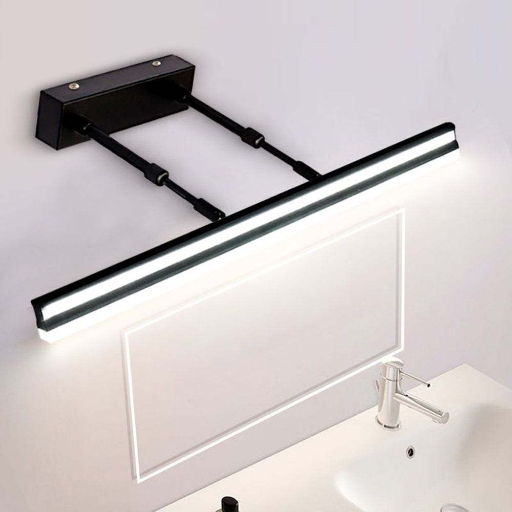 Linear wall lamp above bathroom mirror, industrial style lighting.