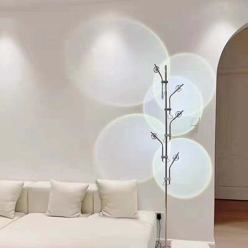 Salgado floor lamp projecting sunset effect in modern living room