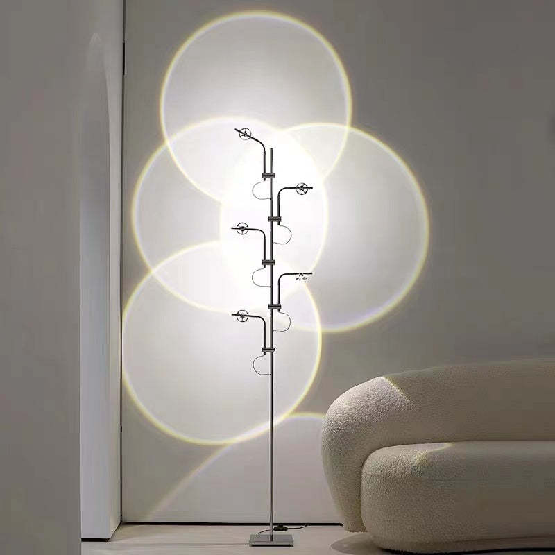 Salgado floor lamp projecting sunset circles, modern interior lighting