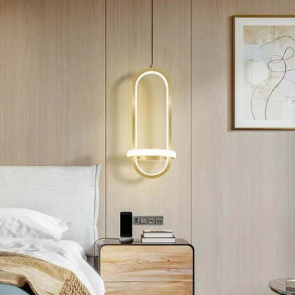 Nyla LED ring pendant light over a bedroom nightstand