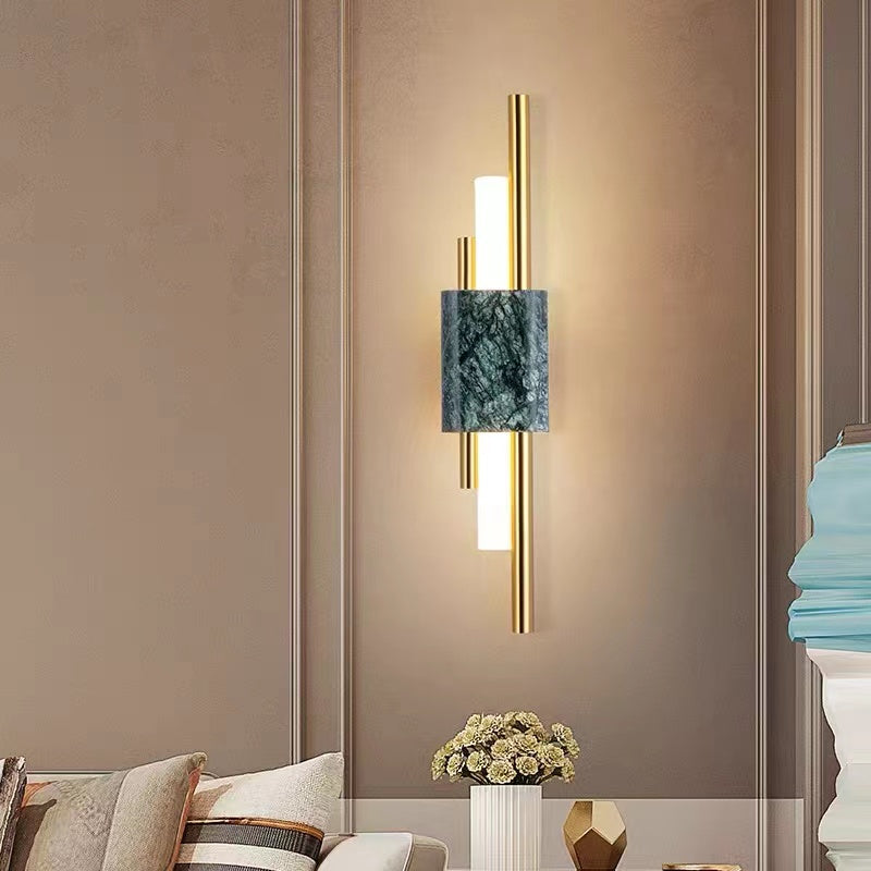 Alana modern wall lamp: metal, marble, and LED lighting.
