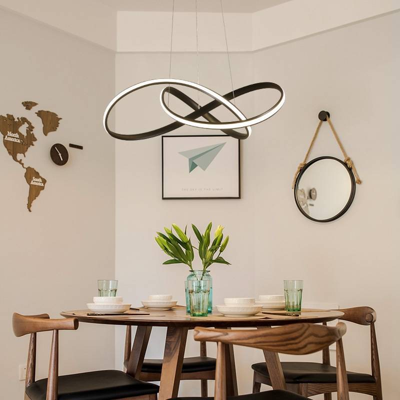 Louise LED pendant light over dining table
