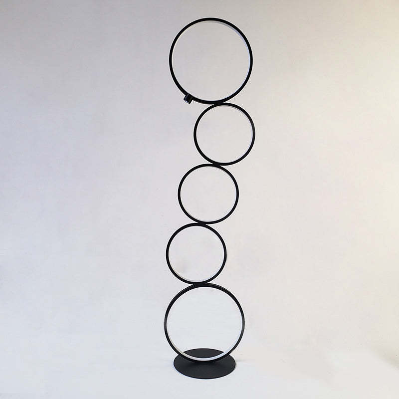 Black Arisha multi-ring floor lamp. Modern metal lighting.