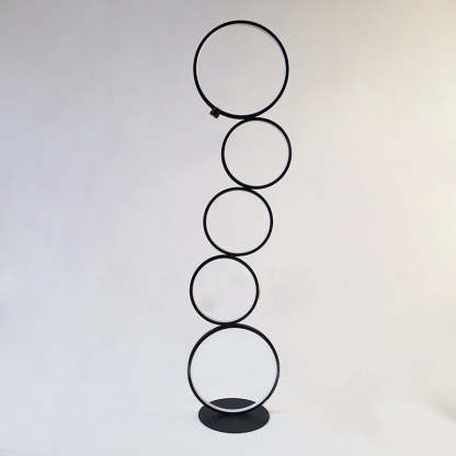 Black Arisha multi-ring floor lamp. Modern metal lighting.