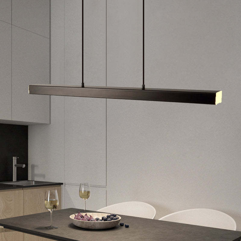 Edge LED pendant light in modern dining room. Linear metal lighting. Edge Modern Linear Metal LED Pendant Light