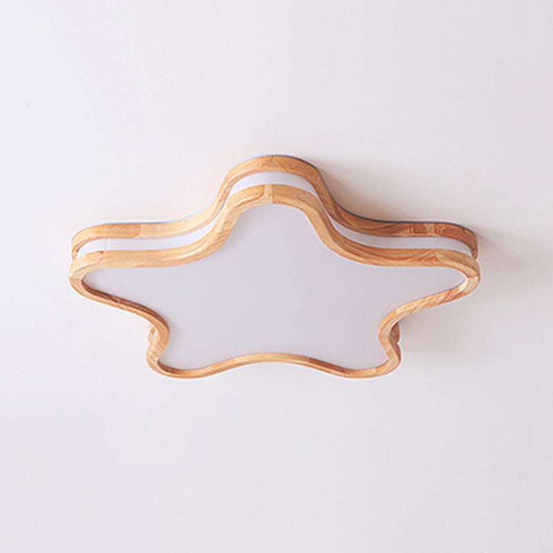 Star shaped flush mount ceiling light, wood and acrylic.