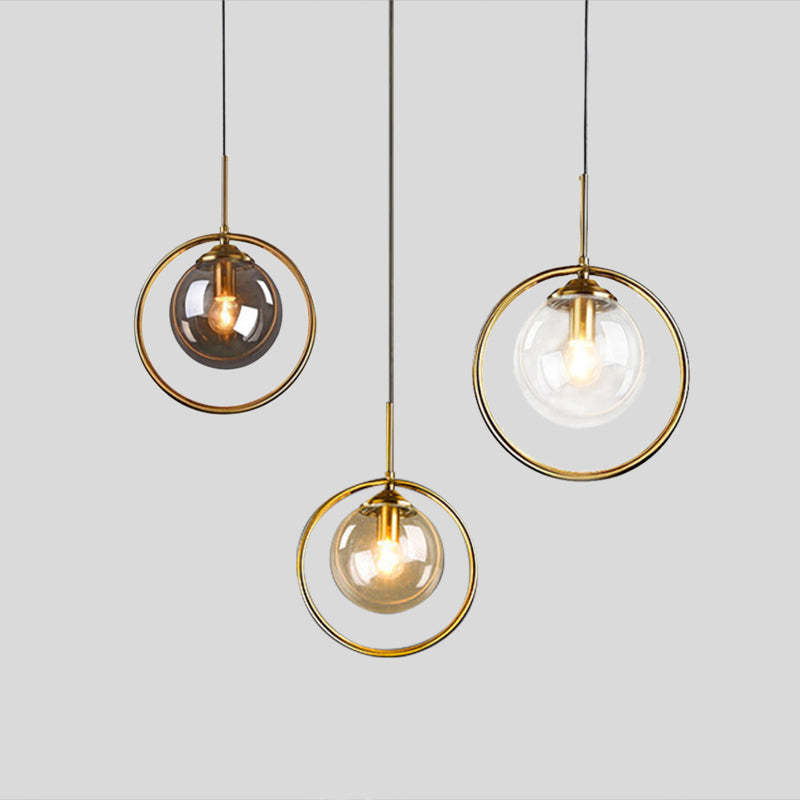 Hailie pendant lights: glass globe shades with metal rings